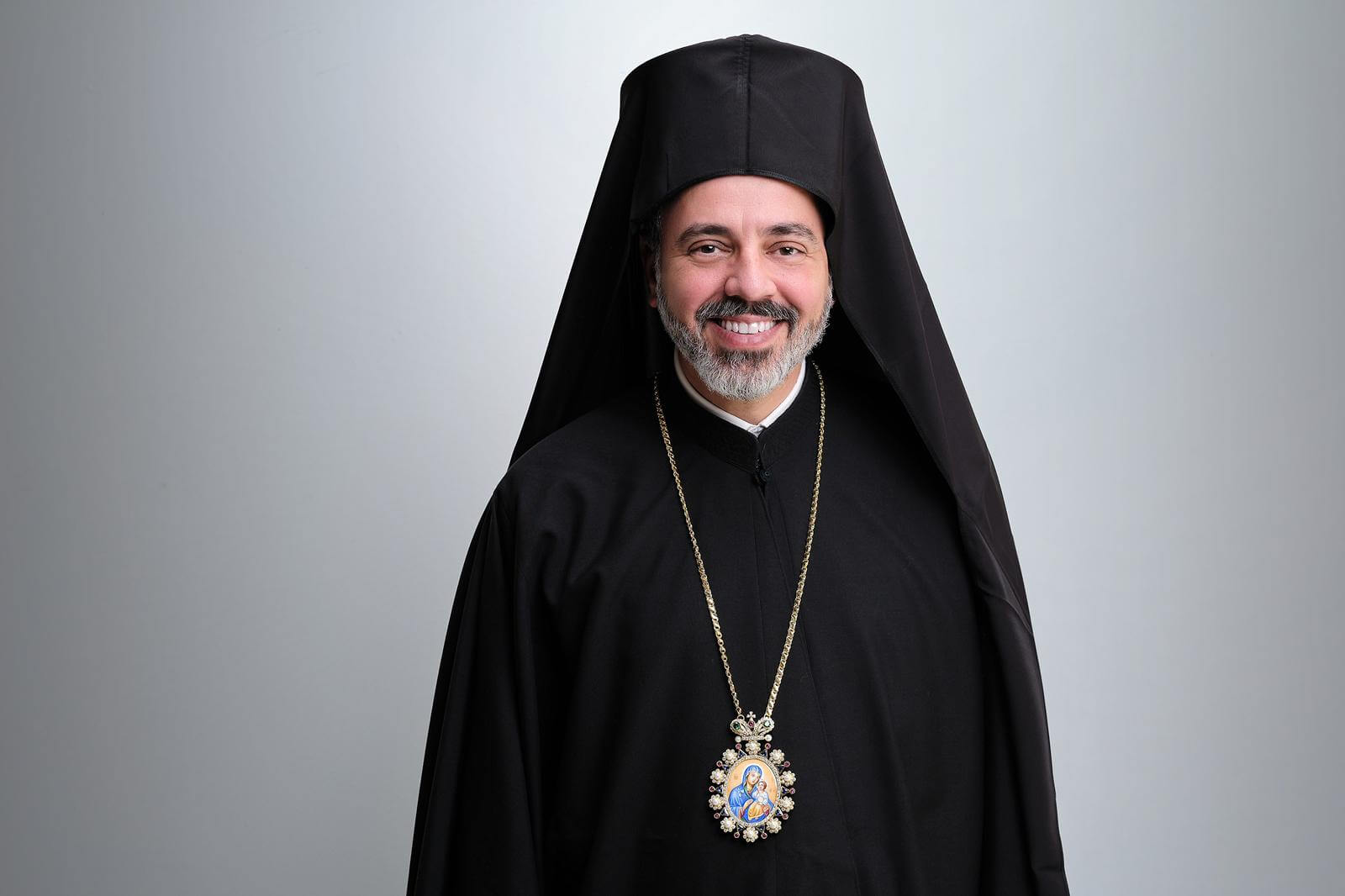 Bishop in black robes, portrait