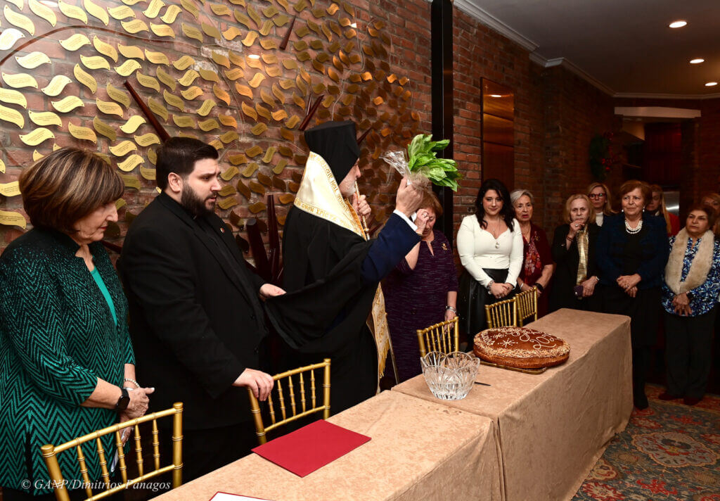Archbishop Elpidophoros cuts Vasilopita for National Philoptochos in NYC, January 2025, traditional Greek celebration.