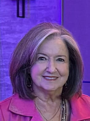 Woman with short hair in purple light, portrait
